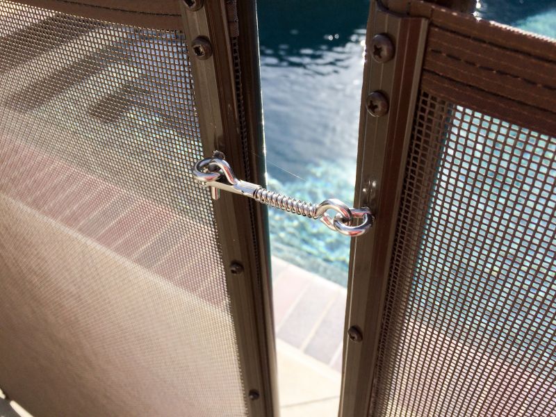 Removable Mesh Fence Securing Pool Area